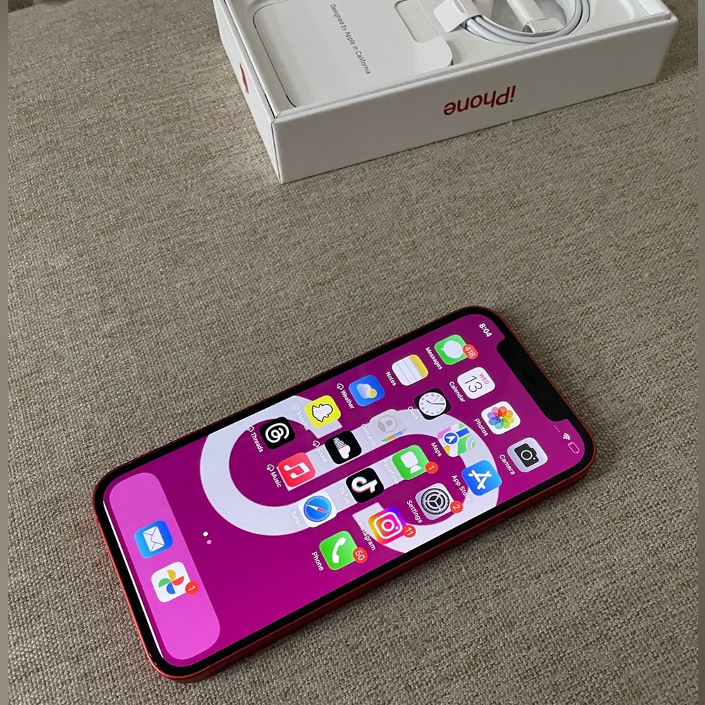 64GB Red IPhone 12 With New Charging Cable and Brand New Box.